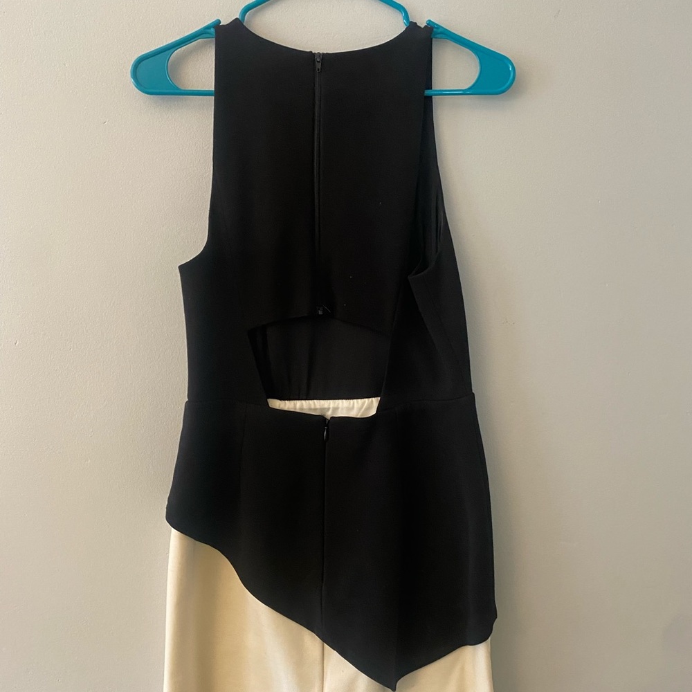 Halston Davina Mini Dress sleeveless with double layer asymmetric bottom.